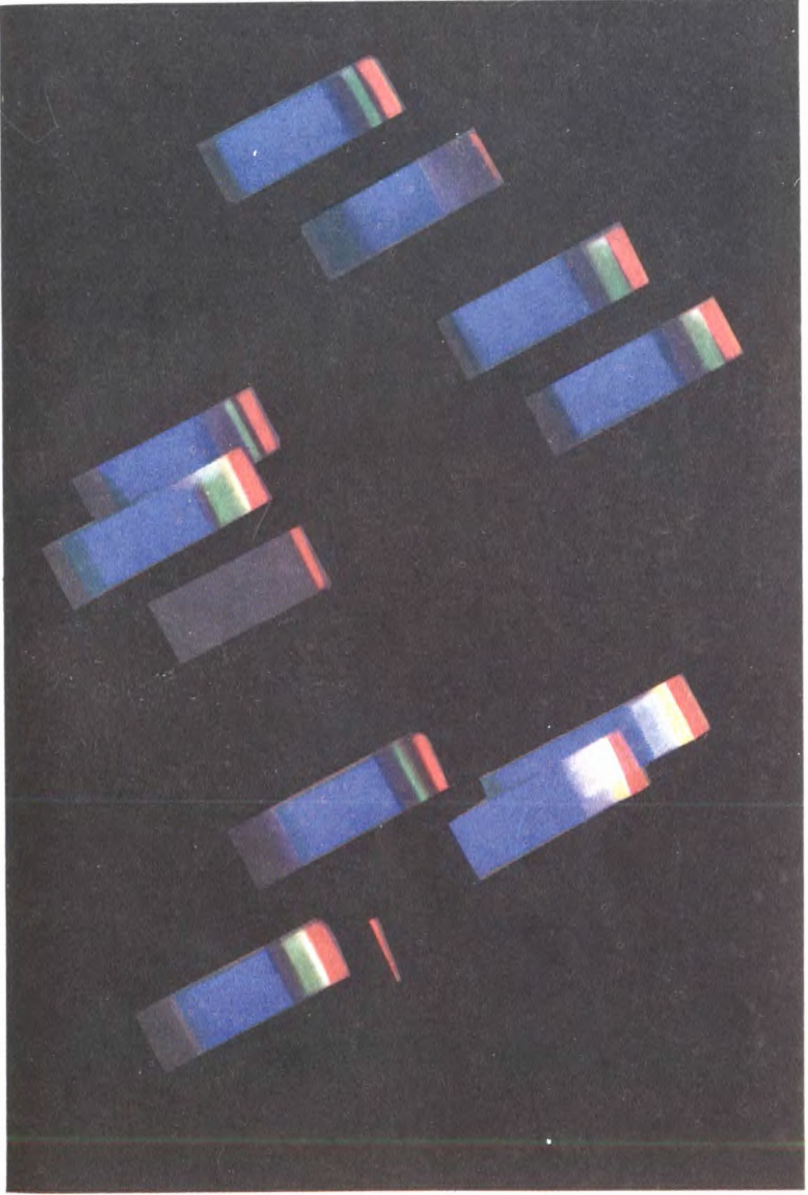 Цветная фотография звездных спектров, полученная с помощью большой призмы, поставленной перед объективом крупного телескопа. Фотография Нассау (США)